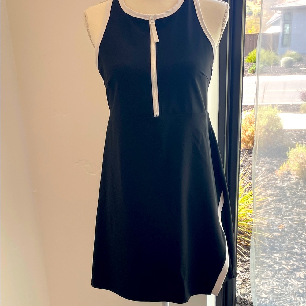 SAGE Sporty dress with shorts. Racer back, split hem. Good for golf. Bra inside.